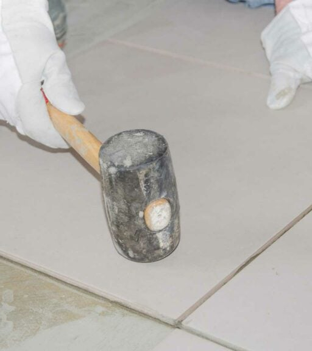 NYC Rubber Flooring technician on a local job
